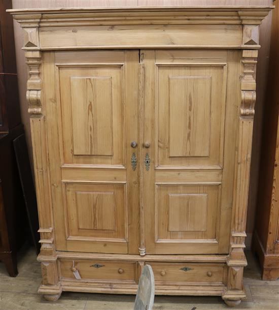 A Continental pine armoire W.145cm